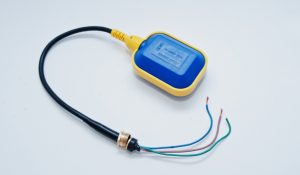 a blue tethered type sewage float switch